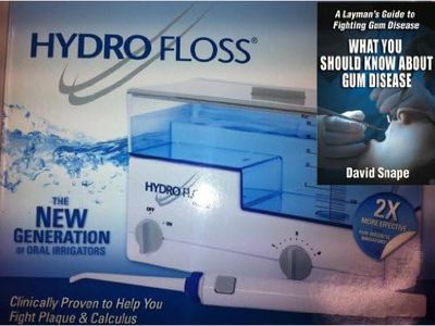 Hydro Floss Oral Irrigator Plus Book Bundled Package - 2 Items