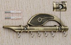 EYE BERRY BASI SALES WITH MISCELLANEOUS DEVICE Brass Wall Key Holder Flute and Peacock Quills Key Holder Wall Hanging Stand Home Decor Key Holder (Bronze)