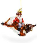 Daring Santa Riding a Bull on The Rodeo Blown Glass Christmas Ornament