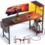 Bestier Gaming Desk with Power Outlets, 44 Inch LED Gamer Desk with 4 Tiers Reversible Shelves, PC Gaming Table with Headset Hook & Side Storage Bag Black Carbon Fiber