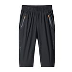 MakingDa Mens Shorts 3/4 Jogger Capri Casual Sports Pants Summer Loose Zip Workout Lightweight Running Training Bottoms Elastic Waist Below Knee Short ​with Zip Pocket（Black，S）