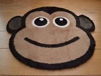 Cheeky Monkey Non Slip Machine Washable Sheepskin Style Kids Rug. Size 77cm x 77cm