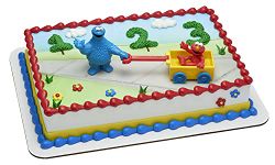 DecoSet® Sesame Street® Let's Play Cake Topper, 2-Piece Birthday Cake Decoration with Cookie Monster and Elmo in a Free-Wheeling Wagon, Ready to Use, Food Safe