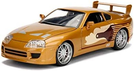 Jada Toys Fast & Furious Slap Jack's 1955 Toyota Supra 1:24 Modelo de afinación de Coche a Escala 1:24 con alerón, Puertas de Apertura, capó y Maletero, Rueda, Bronce