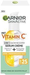 Garnier Crema sérica contra la piel cansada y las manchas oscuras, cuidado de día 2 en 1 para más brillo y una tez uniforme, con vitamina C, Skin Active, 50 ml