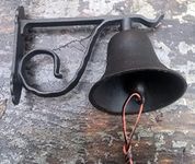 Large Cast iron door bell ringer with leather strap