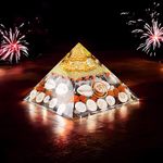 Dhviti crystals 4 Inches Gomti Chakra Maha Laxmi Orgonite Pyramid Wealth Enhancer with Shree Yantra, Rudraksha, Gomti Chakra, Chirmi Seeds & Kaudi Shells | Feng Shui Vastu Solution