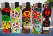 5 X ELECTRONIC - BRIGHT COLOUR FULL SKULLS - LIGHTERS MAXI SIZE GAS REFILLABLE ADJUSTABLE FLAME IN FIVE COLOUR