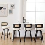 Bekrvio Swivel Bar Height Stools Set of 4, Upholstered Faux Leather Barstools with Rattan Back, 29" Seat Height Tall Bar Stools for Kitchen Counter, Black Wood Frame, Cream White