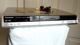 Panasonic DVD Recorder Player DMR-ES10 DIGA DVD-RAM Burner. Silver. DVD Audio / Progressive Scan, RAM Compatible, VCRplus+, Dolby Digital, DTS. 4.7GB DVD-RAM ReWritable Disc Included.