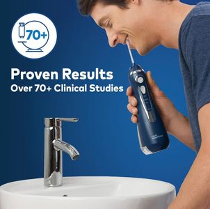 Waterpik Cordless Water Flosser – Portable Oral Irrigator, Blue