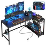 Bestier L Shaped Desk with Power Outlets & LED Lights Reversible 132CM Corner Desk with Shelves Larger PC Workstation with Hooks for Home Office Studying Desk for Bedroom