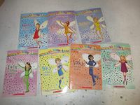 The Rainbow Magic Fairies (Original) Complete Set 1-7: Ruby the Red Fairy, Amber the Orange Fairy, Saffron the Yellow Fairy, Fern the Green Fairy, Sky the Blue Fairy, Inky the Indigo Fairy, & Heather by Daisy Meadows (2009) Paperback