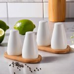 The Better Home Ceramic Salt & Pepper Shakers Set (White - Pack of 2) | Moisture-Proof Seasoning Shakers with Stand | Salt & Pepper Containers | Salt & Pepper Container/Set for Dining Table