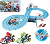 Carrera First Mario Kart - Slot Car Race Track With Spinners - Includes 2 Cars: Mario and Yoshi - Battery-Powered Beginner Racing Set for Kids Ages 3 Years and Up