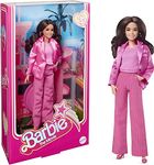 Barbie The Movie Doll, Gloria Collectible Wearing Three-Piece Pink Power Pantsuit with Strappy Heels and Golden Earrings​​​, HPJ98