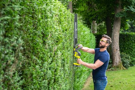 Ryobi 18V ONE+ Cordless Hedge Trimmer, 55cm Blade – Bare Tool