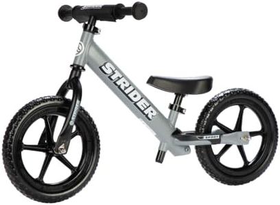 Strider 12” Sport Bike, Matte Gray - No Pedal Balance Bicycle for Kids 18 Months to 5 Years - Includes Safety Pad, Padded Seat, Mini Grips & Flat-Free Tires - Tool-Free Assembly & Adjustments