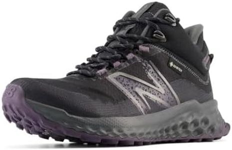 New Balance Women's Fresh Foam Garoé V1 Midcut GTX Trail Running Shoe, Black/Blacktop/Interstellar, 8