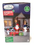 at Home Inflatable Christmas Santa, Gifts, Snowman, and Penguin Lighted Yard Display 9 feet Long