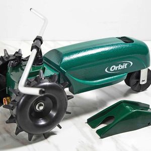 Orbit Traveling Sprinkler – Green Lawn Watering System