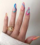 Kikmoya Almond Press on Nails Medium Length Pink Fake Nails with Colorful Swirl Design Stick on Nails for Women and Girls 24pcs Nude Stiletto Glossy Acrylic Artificial Full Cover False Nails