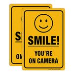 Smile You're On Camera Video Surveillance Sign (2 Pack) - 10 x 7 Inches - .040 Rust Free Heavy Duty Aluminum - Indoor or Outdoor Use for Home Business CCTV Security Camera,UV Protected & Reflective