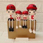 Elegant Lifestyle Love Letters Hanging Legs Family Set, Birthday, House Warming Gift, Cabinet Statues for Home Decor, Cute Couple with Caps Decorative Showpiece (Set of 4)