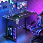 Furb 140cm RGB Gaming Desk with LED Lights, Black PC Computer Desk T Shaped Ergonomic Home Office Desk, Carbon Fibre Texture Gaming Table Workstation with Cup Holder Headphone Hook