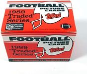 1989 Topps Traded Football Complete Mint 132 Card Set in Original Factory Set Box. Featuring Rookie Cards of Barry Sanders, Troy Aikman, Derrick Thomas, Deion Sanders and Many Others