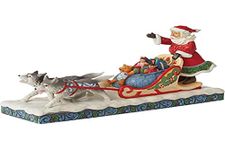 Enesco Jim Shore Heartwood Creek Santa Dog Sledding Figurine, 4.53 Inch, Multicolor