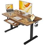 FEZIBO Height Adjustable Electric Standing Desk with Keyboard Tray, 100 x 60 cm Sit Stand up Desk with Splice Board, Black Frame/Rustic Brown Top