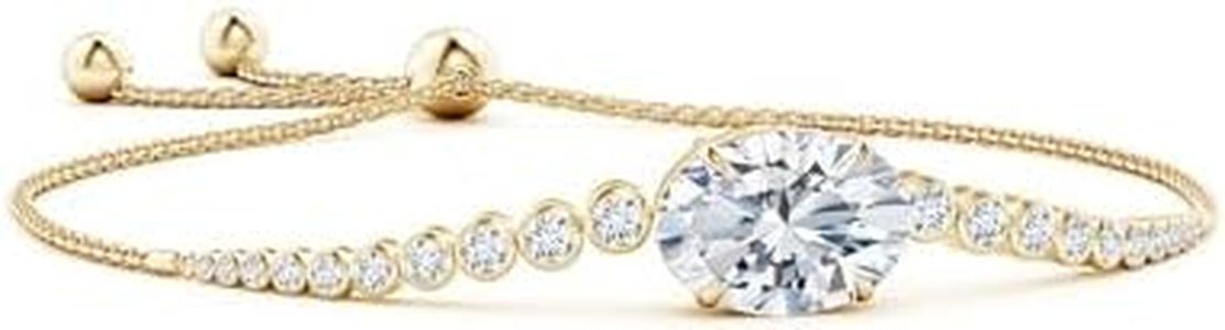 Angara Lab-Grown Oval Diamond Bolo Bracelet with Bezel Diamond Accents in 14K Yellow Gold for Women (Size-9x7mm | Color-F-G | Clarity-VS) | April Birthstone Jewelry