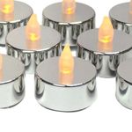 Silver Candles With Flickering Flames