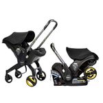 Doona Baby Car Seat & Travel Stroller Nitro Black - Convertible Infant Car Seat, Carry Cot and Pram with 5 Point Safety Harness - Ergonomic Pushchair and Travel System - Latch Base Sold Separately*