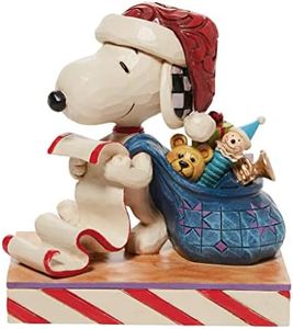 Enesco Jim Shore Peanuts Figurine Père Noël Snoopy avec liste de Noël et sac à jouets, 10 cm, multicolore