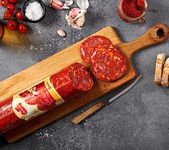 Chorizo Gran Doblon 2KG Paprika marinated meat, chorizo is a staple of spanish cuisine. Perfect in sandwiches or as a part of a tapas or charcuterie spread.Aprox 61 cm Long and 8cm Diameter.