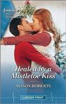 Healed by a Mistletoe Kiss: Curl up with this magical Christmas romance! (Harlequin Medical Romance)