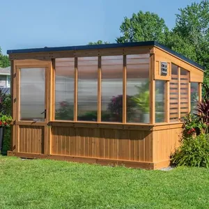 Backyard Discovery Zalie 11' x 7' Cedar Wood and Polycarbonate Walk-in Greenhouse Kit with Exhaust Fan, Windows, Hose Hook-Ups, PowerPort, Staging Shelves for Year-Round Outdoor Gardening