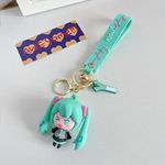 Daiyamondo Premium Keychain Unlock Your Anime Passion 3D Rubber Keychain Extravaganza with Elegant Long Ribbons Perfect for Bag Charm, Car & Bike Gifting & Anti-Rust (Green Girl)