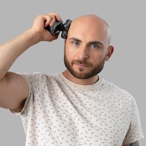 Remington RX7 Electric Head Shaver – Cordless Wet & Dry Grooming