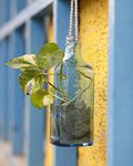 Kavi Recycled Bottle Hanging Planter in Sky Blue: Perfect for plant containers, flower pots, and plant holders, ideal for terrace garden and home garden décor.