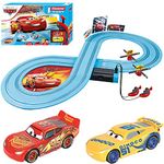 Carrera First Disney/Pixar Cars - Slot Car Race Track - Includes 2 Cars: Lightning McQueen and Dinoco Cruz - Battery-Powered Beginner Racing Set for Kids Ages 3 Years and Up