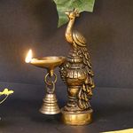 Artvarko Brass Peacock Diya with Bell Table Décor with Stand for Home Diwali Gift Temple Pooja Gold Color Height 6.5 Inch