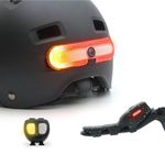 OxiTurn deluxe pack including an OxiTurn light for bikes, scooters or helmets, with 5 red modes and right/left turn signals, an OxiMote remote and an OxiBrake device to activate brake light function