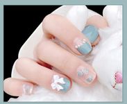 Secret Lives Glossy Artifical Light Blue Color with 3D Bow Design 24PCS Set Reusable Press on Nails for Women with Kit