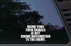 USING YOUR TURN SIGNALS IS NOT GIVING INFORMATION TO THE ENEMY - 7" x 3 3/4" die cut vinyl decal / bumper sticker for windows, cars, JDM, trucks, bumpers, tool boxes, boats, laptops - virtually any hard, smooth surface. MADE IN THE USA