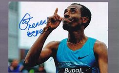 Hand Signed autograph of legendary Ethiopian olympic athlete Kenenisa Bekele,