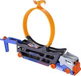 Hot Wheels Toy Car Track Set, Stunt & Go Playset with 1:64 Scale Vehicle, Transforming Hauler Truck with Loop & Launcher, Stores 18 Vehicles