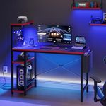 Bestier Gaming Desk with Power Outlets, 44 Inch LED Gamer Desk with 4 Tiers Reversible Shelves, PC Gaming Table with Headset Hook & Side Storage Bag Black Carbon Fiber